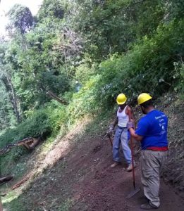Crew members work on a new trail
