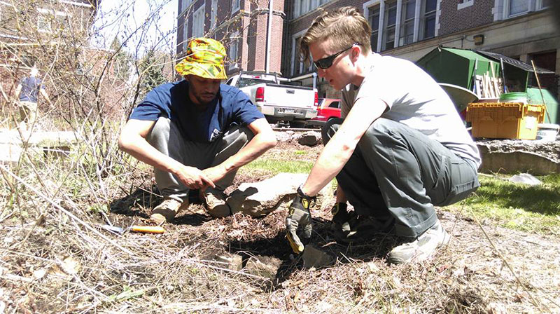 Team leader Nathaniel with Mo Copeland from StormWorks, learning about green infrastructure